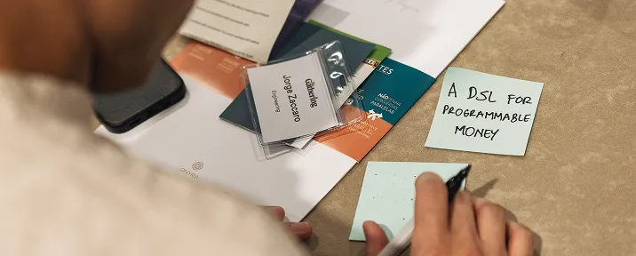 Workshop materials, name badges, and handwritten notes